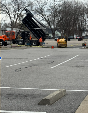 Potholes being filled at Toll Gate